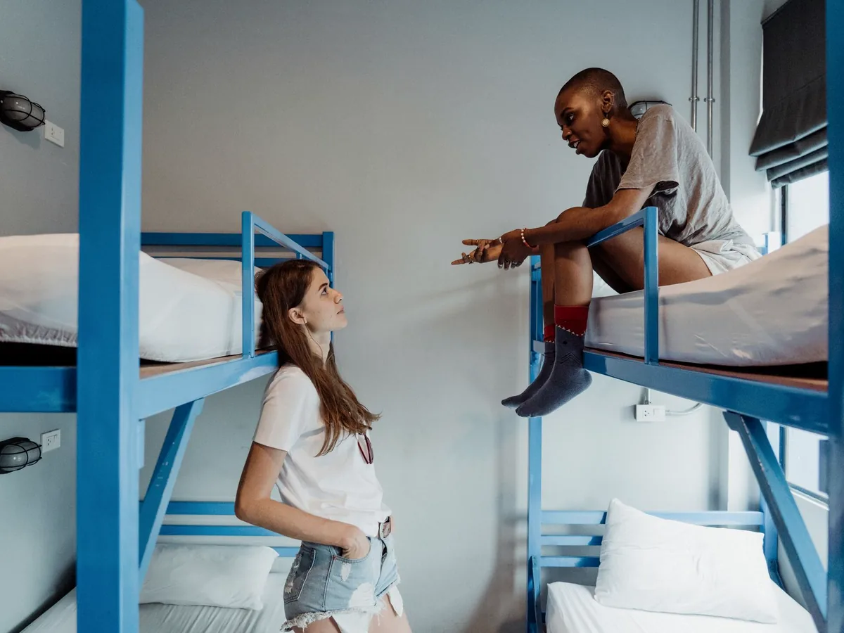 A simple hostel dormitory room, illustrating the accommodation available to outstation candidates